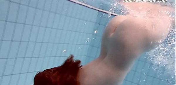  Underwater swimming teenie Lenka gets naked